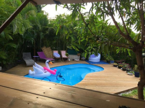 Bungalow d'une chambre avec vue sur la mer piscine partagee et jardin clos a Saint Paul